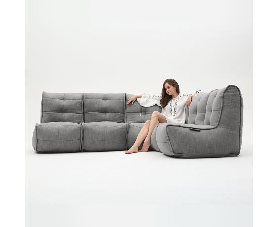 тёмно-серое Г-образный модульный диван Mod4 L Sofa шенилловое в интерьере гостиная
